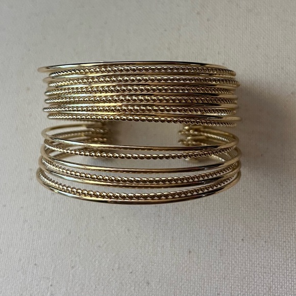 Elegant Gold Tone Cuff Bracelet - Picture 3 of 4